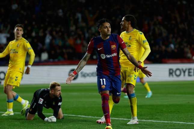 Selebrasi Raphinha dalam laga La Liga antara Barcelona vs Las Palmas, Minggu (31/3/2024). (c) AP Photo/Joan Monfort