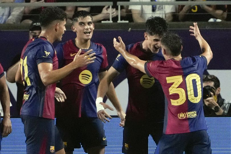 Pemain Barcelona usai mencetak gol ke gawang Man City pada laga pramusim (c) AP Photo/John Raoux